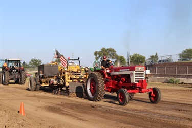 The restored tractor showing off its shine and strength