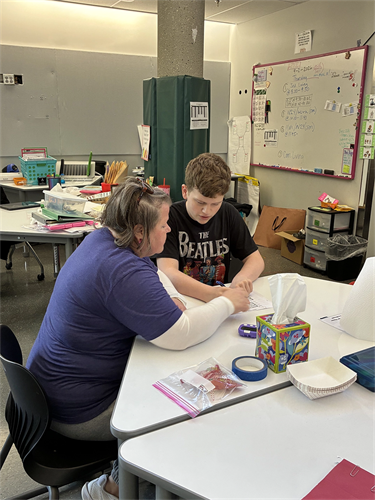 Aiden with teacher