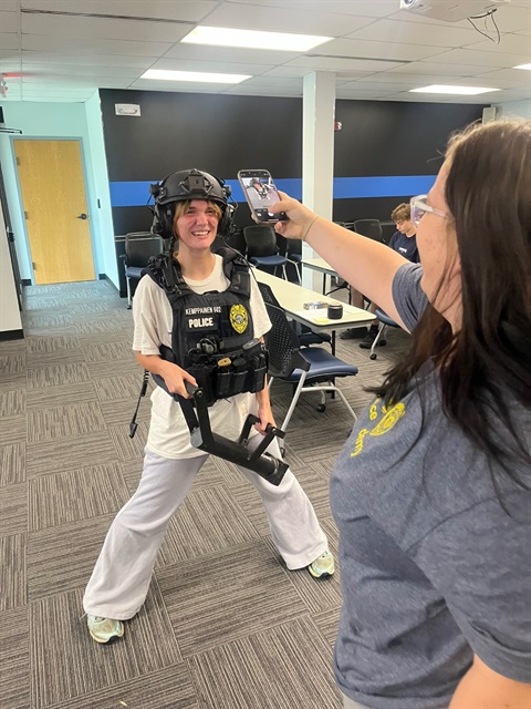 Teen wearing police gear